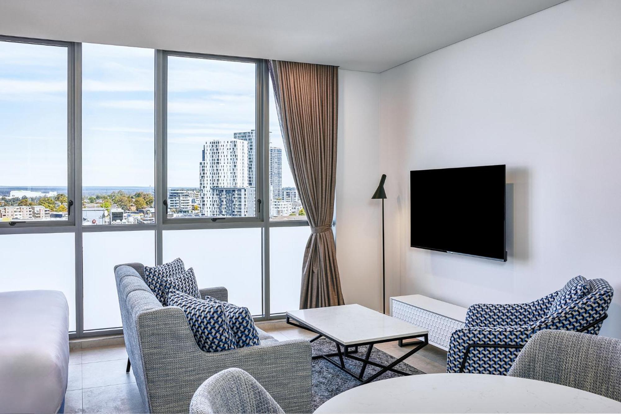 Meriton Suites Ливерпуль Экстерьер фото Living room